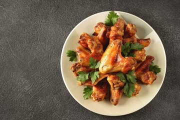 Grilled chicken wings with parsley.