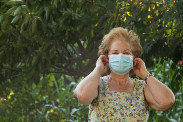 portrait of senior woman with face mask