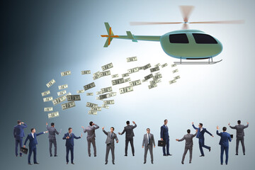 Fototapeta na wymiar Businessman in helicopter money concept