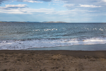 Fototapeta na wymiar Blackmans Bay beach on a sunny winter day in South Hobart in Tasmania