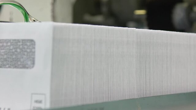 Stack of Envelopes grows larger as absentee ballots or taxes are sent via mail
