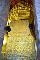 Reclining Buddha art detail at Wat Pho in Bangkok, Thailand