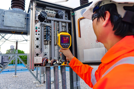 Electrical engineers used a thermometer to check for faults in equipment sets, Also known as preventive maintenance to reduce the damage of equipment.