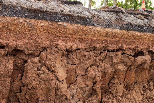 Soil under the road, which has been eroded in the countryside.