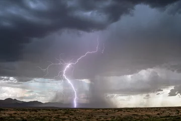 Fotobehang Lightning storm in the Chiricahua Mountains near Willcox, Arizona. © JSirlin