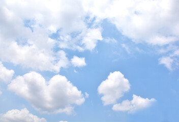 Obraz premium Bright Blue sky with white cloud. Beautiful sky background and wallpaper. Clear day and good weather in the morning. 