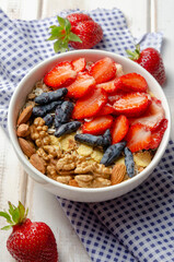 Homemade muesli bowl with strawberry, banana