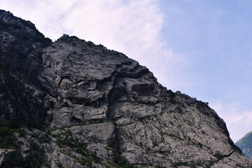Panorama of rocks covered with trees. Caucasus, North Ossetia.