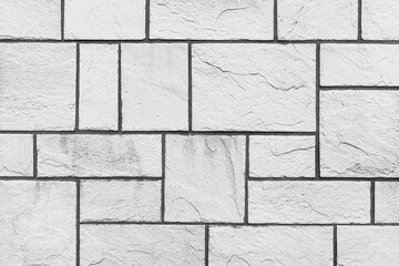 Fototapeta premium Block pattern of white stone cladding wall tile texture and seamless background