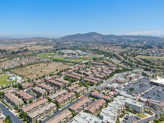 Aerial view of Torrey Santa Fe, middle class subdivision neighborhood with residential villas in San Diego County, California, USA.