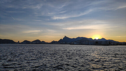 Naklejka na ściany i meble Sunset from a ship overlooking Rio de Janeiro.