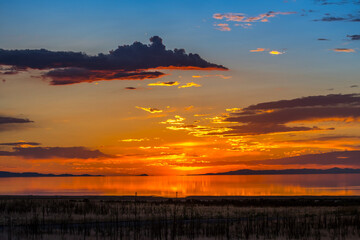 Dramatic vibrant sunset scenery in Antelope Island State Park, Utah