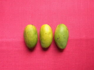 Yellow color ripe whole fresh Dasheri mangoes