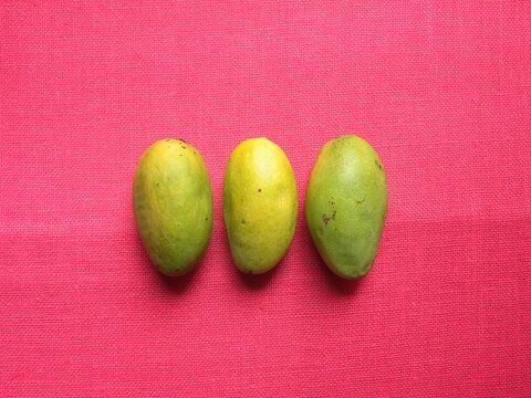 Yellow color ripe whole fresh Dasheri mangoes