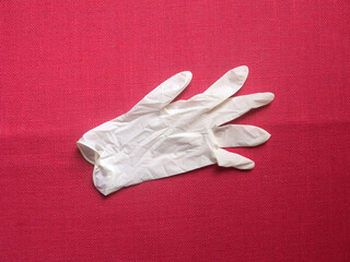 White color disposable medical glove