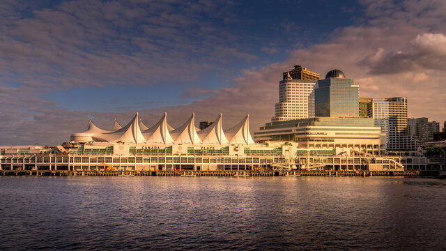 Vancouver, British Columbia/Canada - July 11, 2019: Sunset over Canada Place, the Cruise Ship Terminal at the shore of Burrard Inlet in Downtown Vancouver