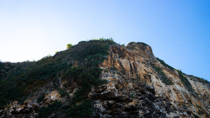 Fototapeta na wymiar High cliffs with blue sky