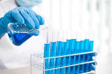 Medical scientists have experimented with liquid chemicals in vitro to analyze viral data in chemical laboratories. Scientific research concepts