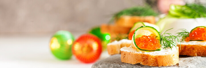 Sandwich with ricotta, a cucumber, caviar .