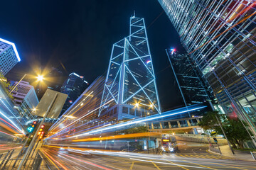Fototapeta na wymiar Traffic in downtown district of Hong Kong city at night