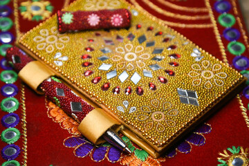 Rajasthani handicraft Decorated diary with pen Jaipur India. Book adorned with the lovely mirror...