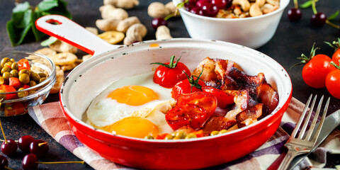 Breakfast including coffee, fried egg , becon. nut , muesli and bread . Selective focus