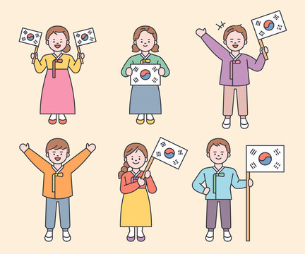 Cute characters wearing traditional Korean costumes are holding the Korean flag. flat design style minimal vector illustration.