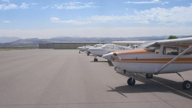 Small Airport Natural Blur Background Plates for Greenscreen and LED Walls, 4-in-1 Seamless Looping Multi-Pack 35mm, 50mm, 85mm, 130mm Near Aircraft 4k