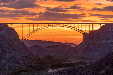 sunset on the bridge with base jumpers