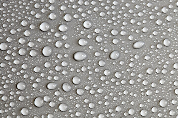 Large number of water drops. Abstract background texture. Waterfalls on a solid background, collecting bubbles on a clean surface. Raindrops, a series of natural photographs