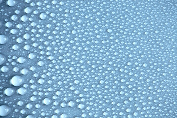 Large number of water drops. Abstract background texture. Waterfalls on a solid background, collecting bubbles on a clean surface. Raindrops, a series of natural photographs