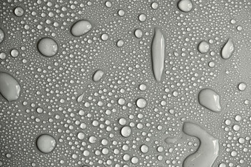Large number of water drops. Abstract background texture. Waterfalls on a solid background, collecting bubbles on a clean surface. Raindrops, a series of natural photographs