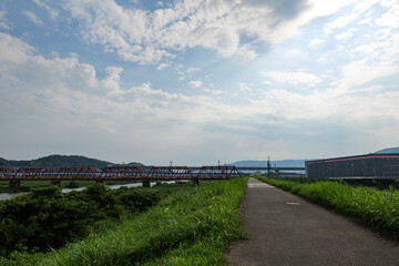 Fototapeta na wymiar Blue sky on the banks of the Kizugawa River in Kyoto, Japan on July 19, 2020.