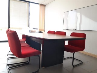 interior of a modern office and red chair