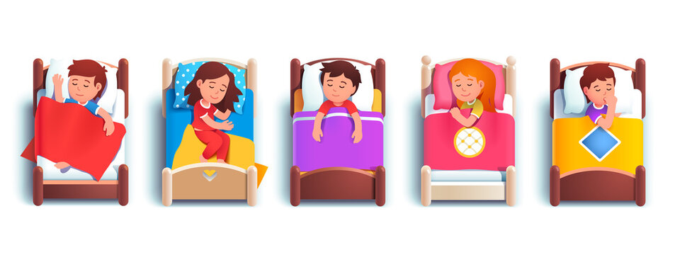 Boy and girls kids sleeping in kindergarten beds
