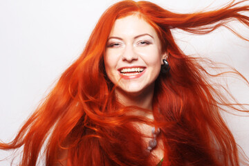 Fototapeta premium woman with long flowing red hair