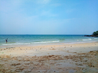 Fototapeta na wymiar Blue sky, beach, sea, sand