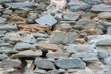 Vintage gray green color stone wall background and texture,