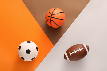 Sports balls on color background