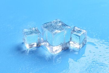 Ice cubes on color background