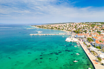 Croatia, aerial view of town Novalja on the island of Pag, marina with boats and turquoise sea in foreground, tourist destination on Adriatic sea