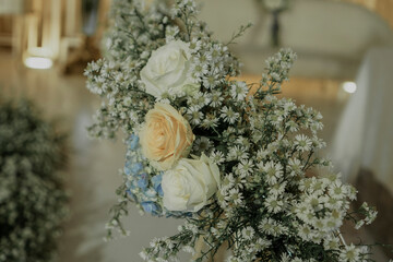 flower bouquet on wedding chair. golden concept wedding