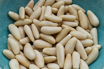 Pine nuts in a bowl closeup