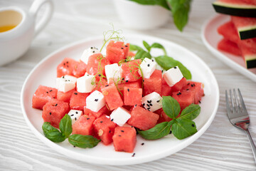 salad of red watermelon, feta cheese and basil