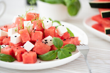 salad of red watermelon, feta cheese and basil