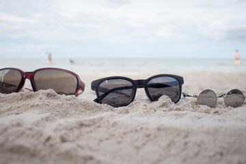 eye sunglasses on sand
