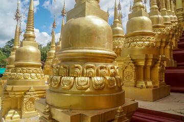 Fototapeta na wymiar Saraburi / Thailand - July 26 2020: close up golden pagoda in temple for Buddhist worship