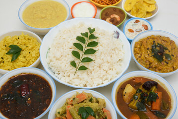 Kerala Onam sadhya, boiled rice with many curries Parippu, Sambar, dessert Payasam . traditional...