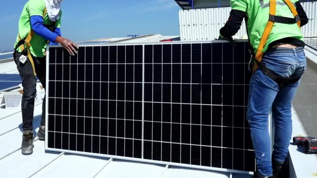 Cinematic footage of the installation of solar panels for energy sustainability