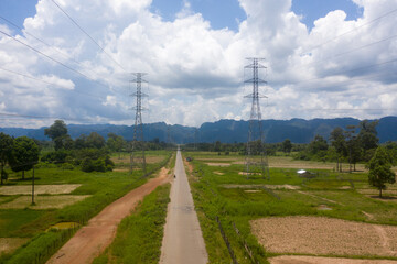 Fototapeta na wymiar Aerial view of country road to mountain showing scenic view of nature in Laos.